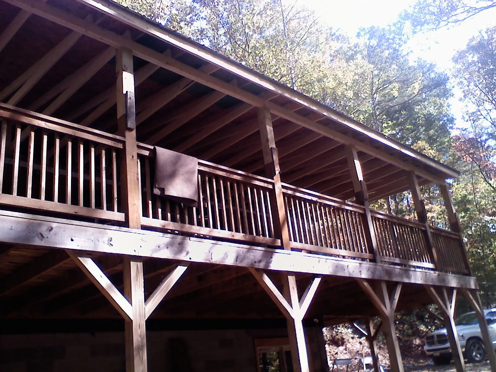 Timber framing under a new elevated porch and deck — Roof Leak Repair in Mill Run by Roofing Brothers